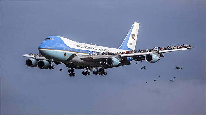 Why Are Liberal Idiots Sharing This Picture Of Refugees On The Wings Of Air Force One?